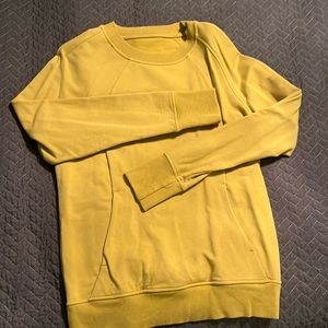 mustard yellow lulu lemon sweatshirt with front pockets